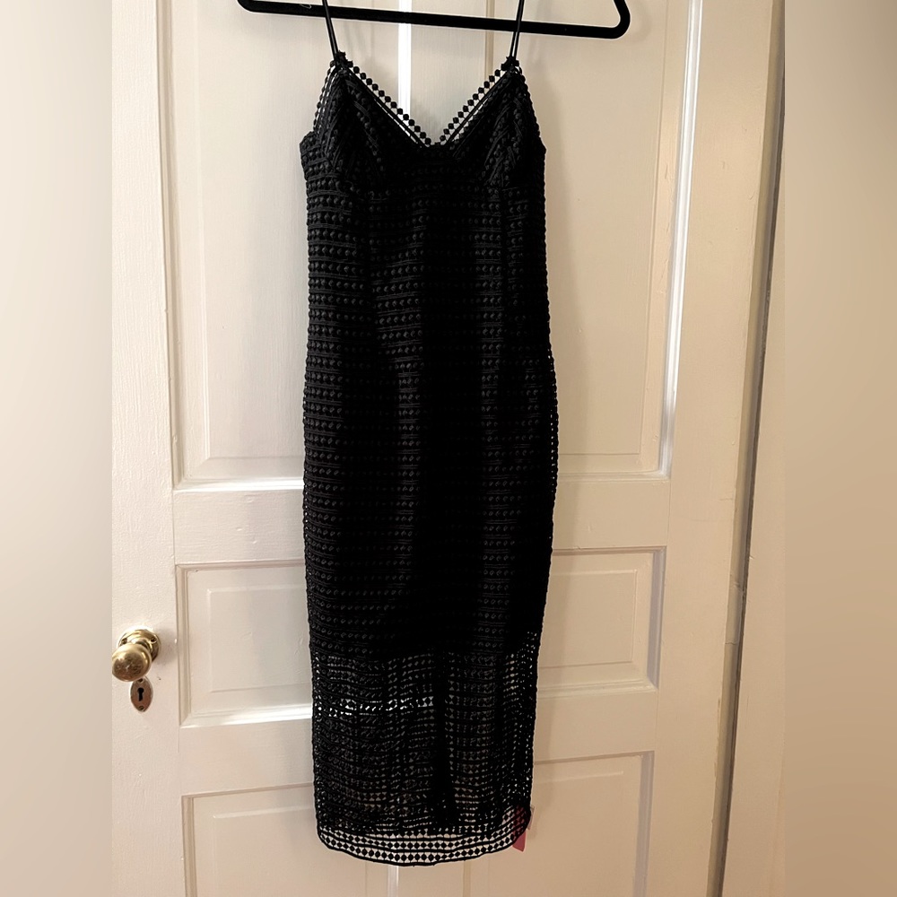 Fitted, black, midi, polka dot pattern dress with spaghetti straps